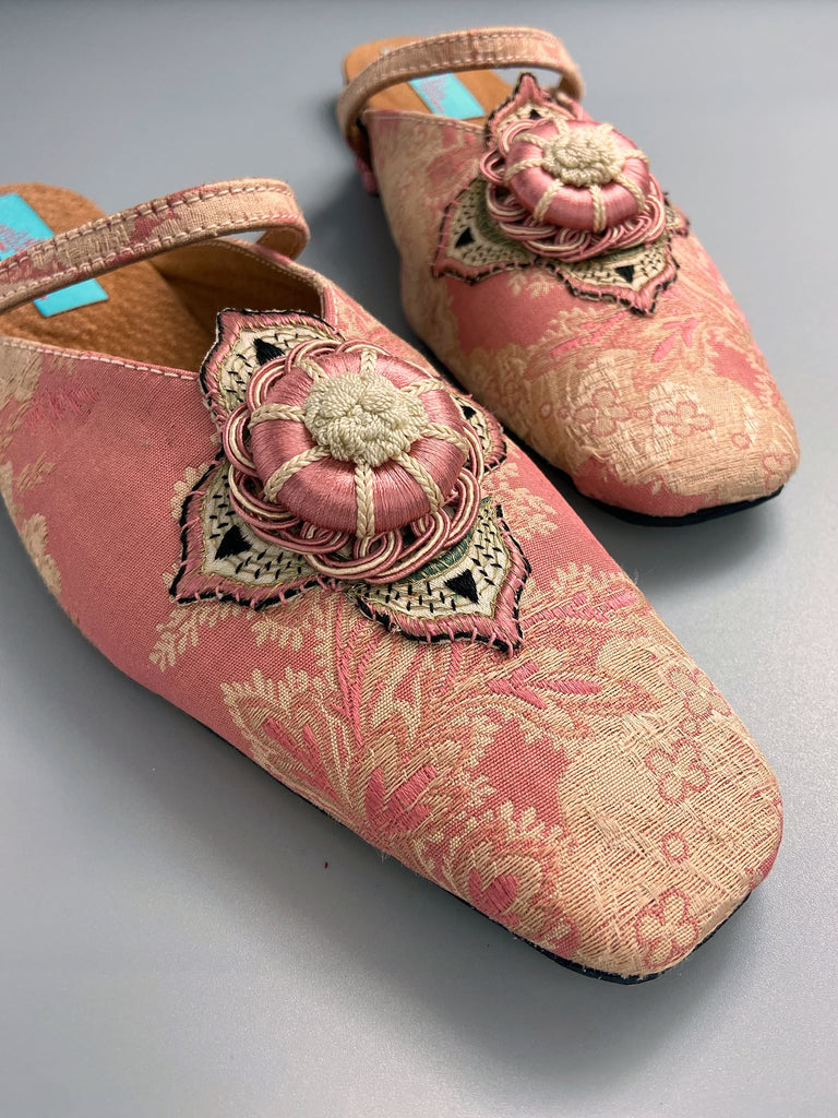 Dusty pink square toed silk brocade shoes with silk rosettes. Bohemian styles created from antique textiles by the Pavilion Parade studio.