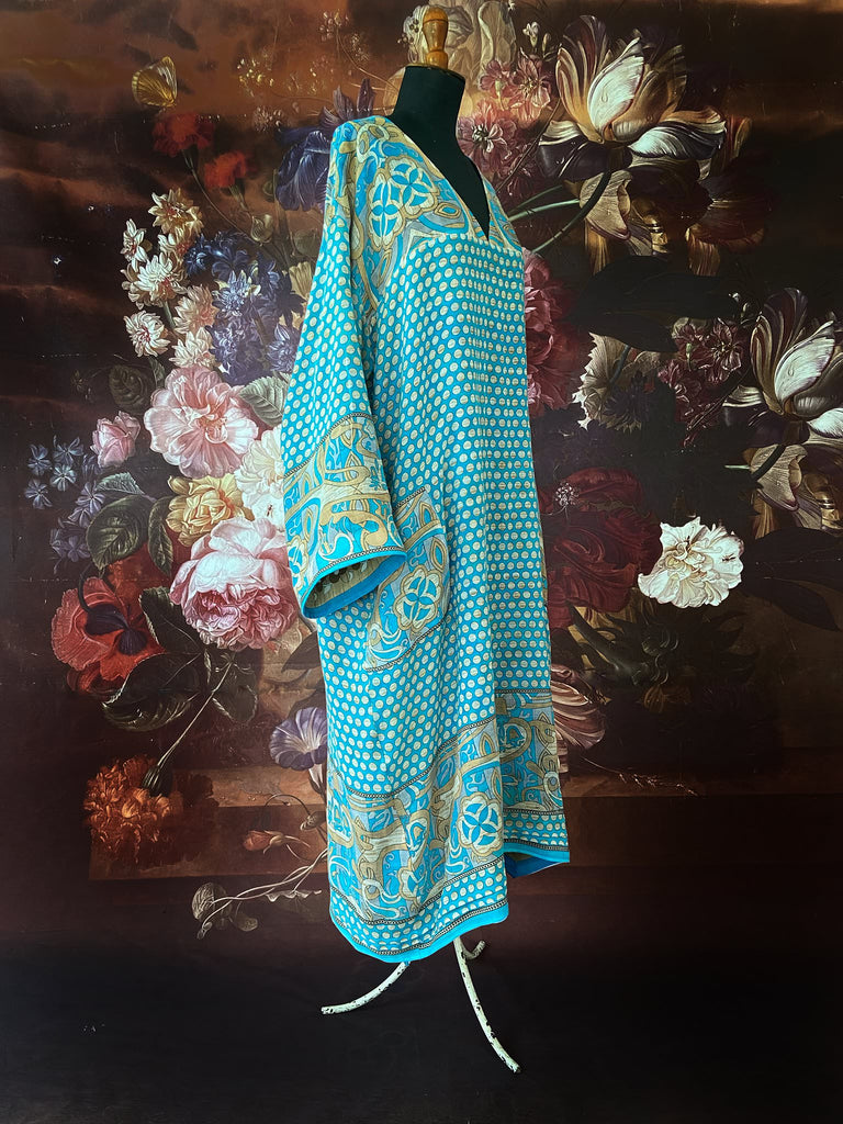 Cerulean blue and turquoise reversible fine cotton kaftan dress. Bohemian style sustainably created from antique and vintage textiles by the Pavilion Parade studio.