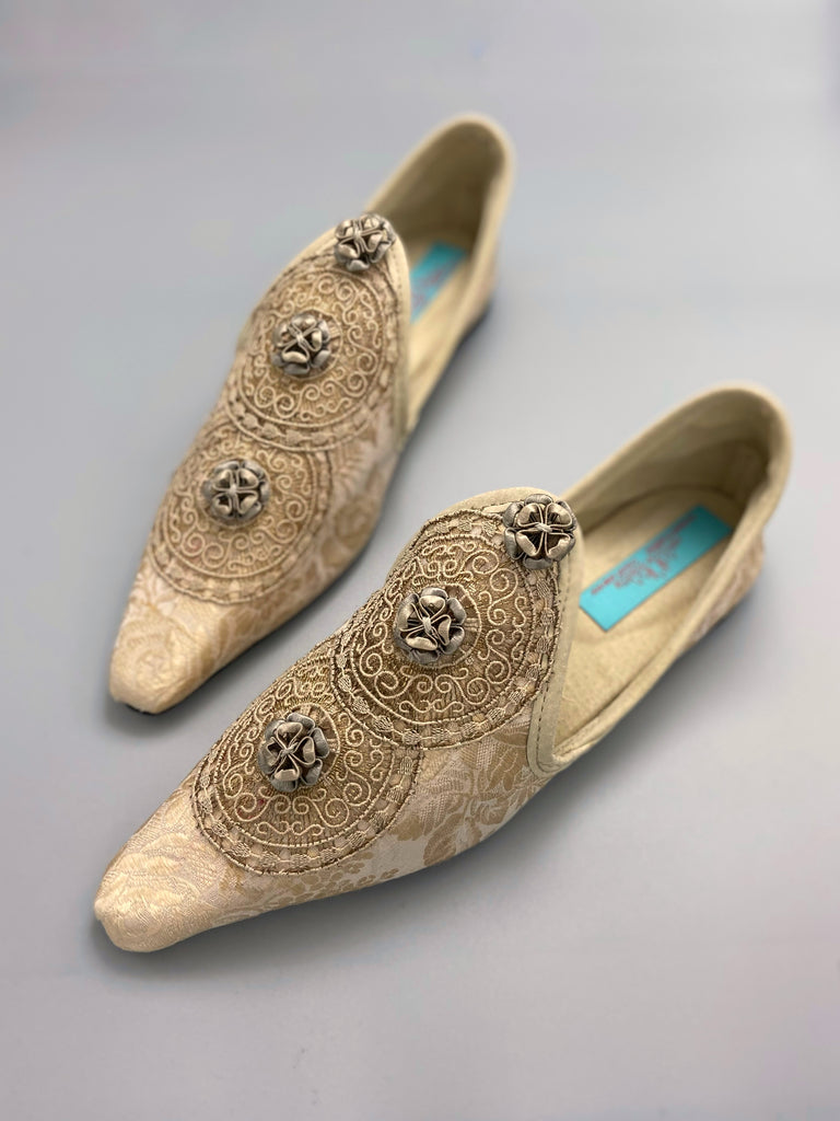 Cream and rose gold silk damask pointed toe shoes  with linen and gold metallic filigree lacework medallions. Finished with little vintage silk passementerie rosettes. Bohemian costume shoes created from antique textiles by Pavilion Parade.