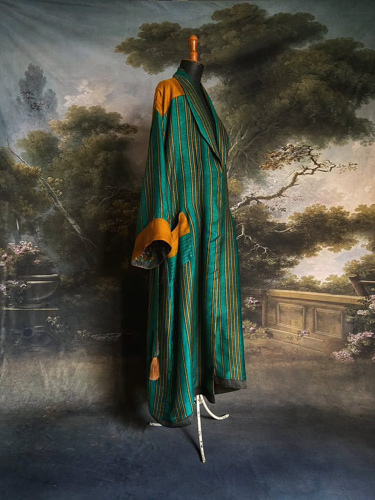 Teal green and canary yellow stripe fine wool robe lined in vibrant block printed silk crepe. Tassel sash belt, deep pockets and wide sleeves, Bohemian style sustainably create from vintage and antique textiles by the Pavilion Parade studio
