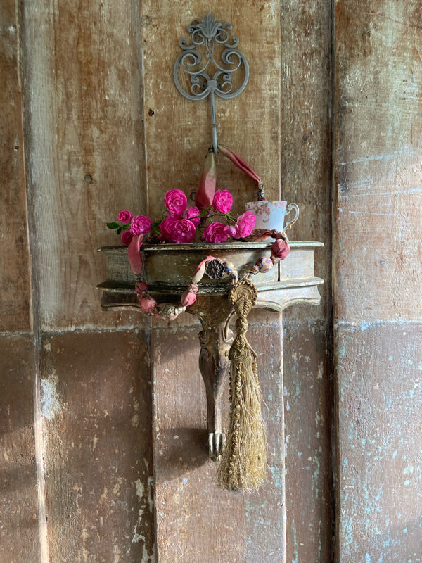 1920s style long silk sautoir necklace with antique tassel embellishment. Bohemian style from vintage textiles by Pavilion Parade. 