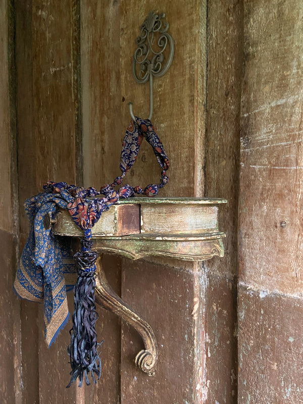 1920s style long silk sautoir necklace with antique tassel embellishment. Bohemian style from vintage textiles by Pavilion Parade. 