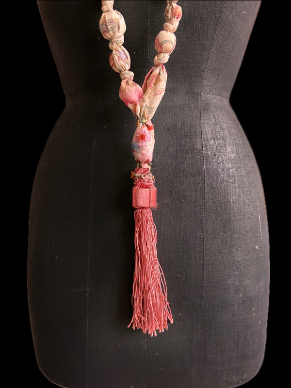 1920s style long silk sautoir necklace with antique tassel embellishment. Bohemian style from vintage textiles by Pavilion Parade. 