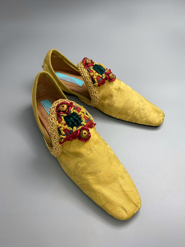 Golden yellow antique silk shoes with red and green silk chenille passementerie braid embellishment. Bohemian styles by Pavilion Parade