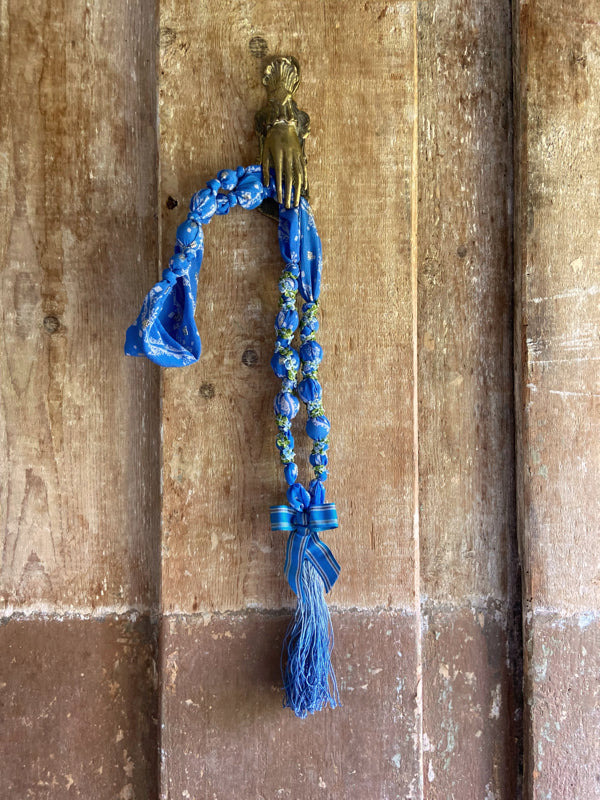1920s style long silk sautoir necklace with antique tassel embellishment. Bohemian style from vintage textiles by Pavilion Parade. 