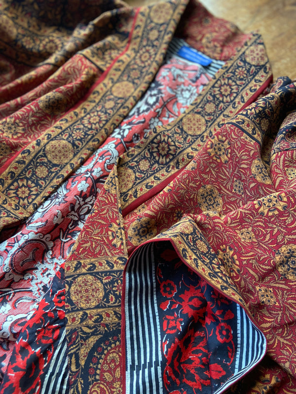 1920s inspired silk kimono robe created from vintage black, mustard, and dark sienna red silk crepe. Unique bohemian designs from the Pavilion Parade studio.