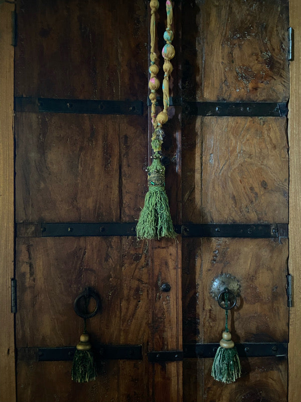 Aesthetic Movement inspired long silk sautoir necklace with antique tassel embellishment. Bohemian style from vintage textiles by Pavilion Parade. 