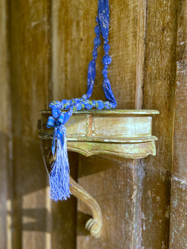 1920s style long silk sautoir necklace with antique tassel embellishment. Bohemian style from vintage textiles by Pavilion Parade. 