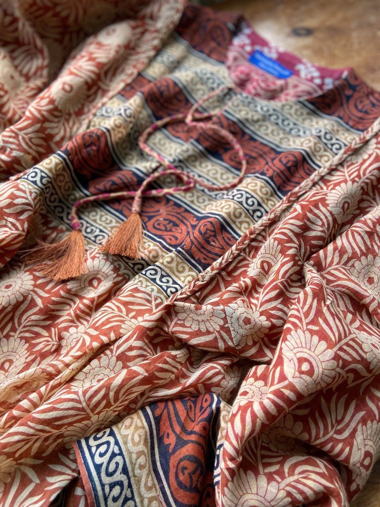 Reversible russet cotton kaftan maxi dress with pockets and wide sleeves. Unique bohemian styles created from antique and vintage textiles by the Pavilion Parade Studio.