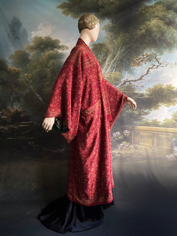 Full length 1920s inspired kimono robe with large patch pockets. Newly created from a claret red, apricot and sage vintage silk crepe. Fully lined in silk with French seams throughout. Bohemian styles sustainably created from antique and vintage textiles by the Pavilion Parade studio.