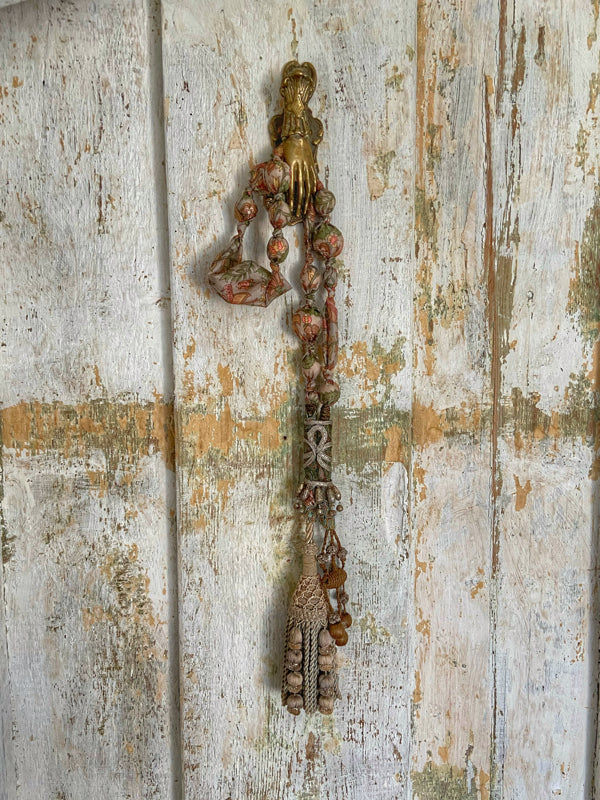 Aesthetic Movement inspired long silk sautoir necklace with antique tassel embellishment. Bohemian style from vintage textiles by Pavilion Parade. 