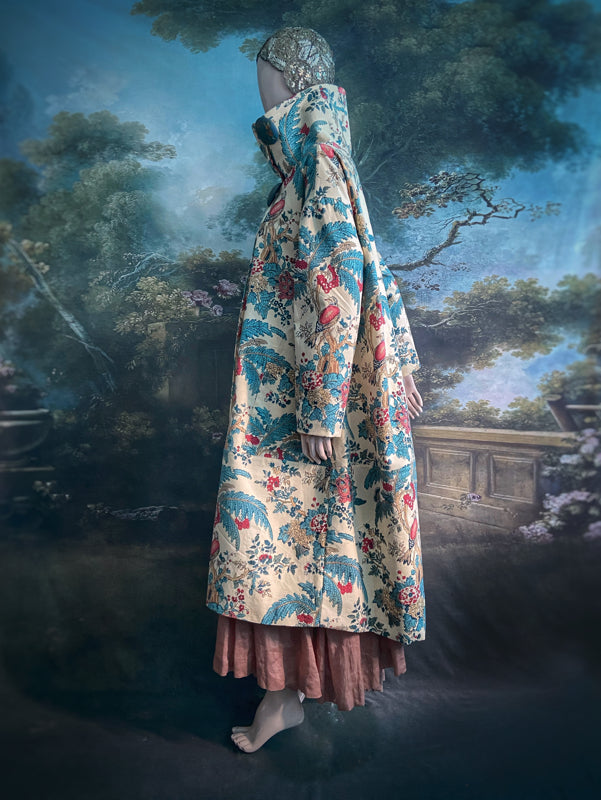 Funnel neck opera coat created from a vintage cotton Indienne featuring exotic birds and florals. Bohemian style created from vintage and antique textiles by Pavilion Parade