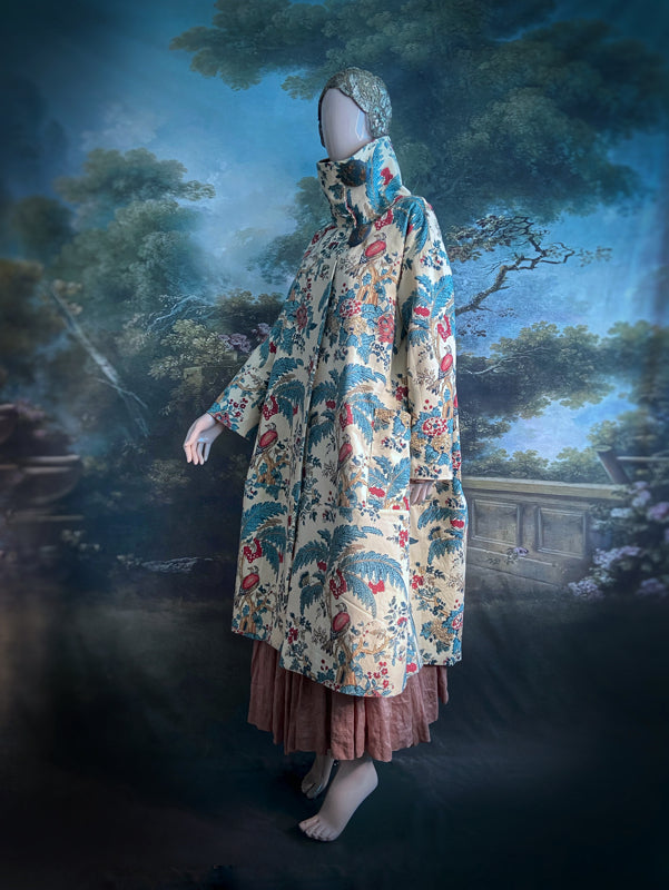 Funnel neck opera coat created from a vintage cotton Indienne featuring exotic birds and florals. Bohemian style created from vintage and antique textiles by Pavilion Parade