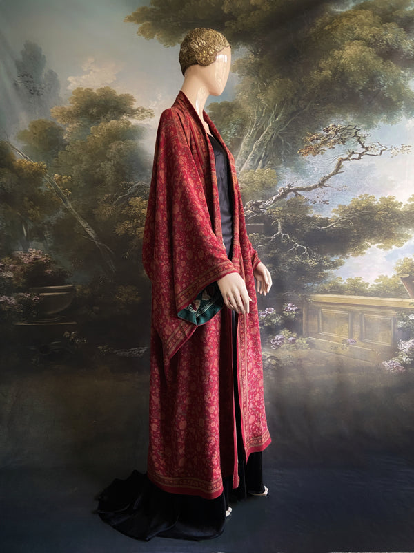 Full length 1920s inspired kimono robe with large patch pockets. Newly created from a claret red, apricot and sage vintage silk crepe. Fully lined in silk with French seams throughout. Bohemian styles sustainably created from antique and vintage textiles by the Pavilion Parade studio.