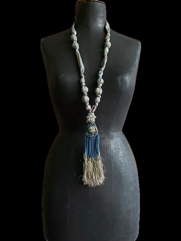 1920s style long silk sautoir necklace with antique tassel embellishment. Bohemian style from vintage textiles by Pavilion Parade. 