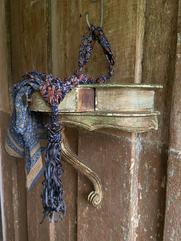 1920s style long silk sautoir necklace with antique tassel embellishment. Bohemian style from vintage textiles by Pavilion Parade. 