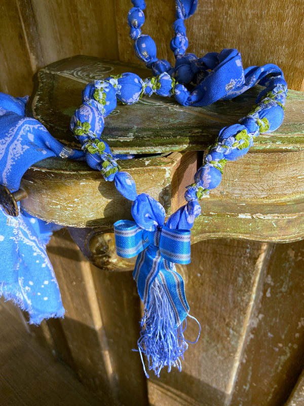 1920s style long silk sautoir necklace with antique tassel embellishment. Bohemian style from vintage textiles by Pavilion Parade. 