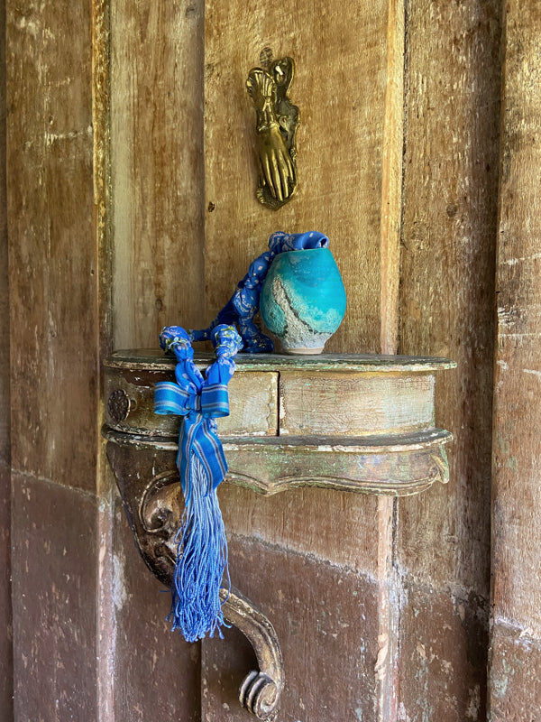 1920s style long silk sautoir necklace with antique tassel embellishment. Bohemian style from vintage textiles by Pavilion Parade. 