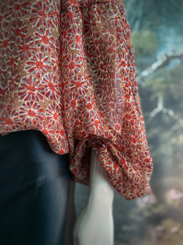 Cinnamon and caramel silk georgette Pierrot blouse with long full sleeves and adjustable drawstring frilled neckline. Bohemian styles sustainably created from antique and vintage textiles by the Pavilion Parade studio. 