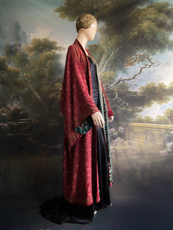 Full length 1920s inspired kimono robe with large patch pockets. Newly created from a claret red, apricot and sage vintage silk crepe. Fully lined in silk with French seams throughout. Bohemian styles sustainably created from antique and vintage textiles by the Pavilion Parade studio.