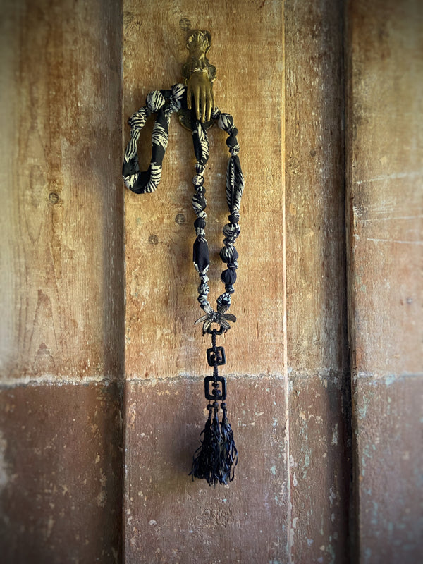 Aesthetic Movement inspired long silk sautoir necklace with antique tassel embellishment. Bohemian style from vintage textiles by Pavilion Parade. 