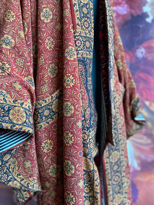 1920s inspired silk kimono robe created from vintage black, mustard, and dark sienna red silk crepe. Unique bohemian designs from the Pavilion Parade studio.