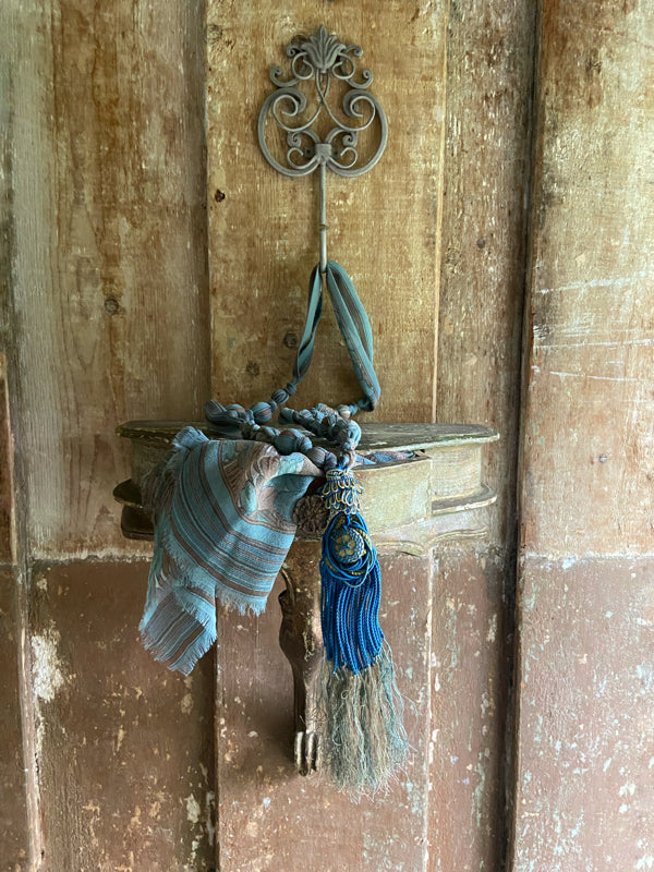 1920s style long silk sautoir necklace with antique tassel embellishment. Bohemian style from vintage textiles by Pavilion Parade. 