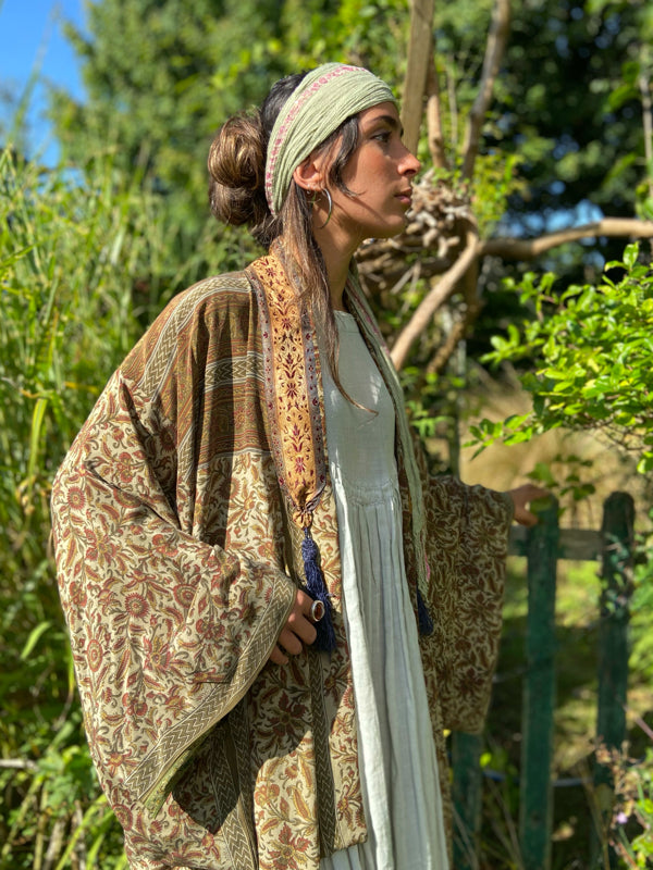 Full length 1920s inspired kimono robe with large patch pockets. Newly created from a rust, olive green and sage vintage silk crepe. Fully lined in silk with French seams throughout. Bohemian styles sustainably created from antique and vintage textiles by the Pavilion Parade studio.