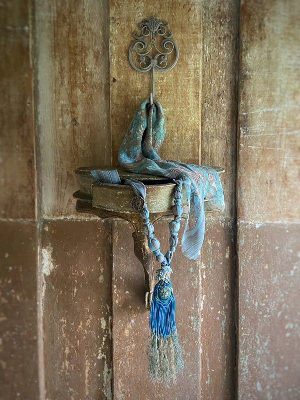 1920s style long silk sautoir necklace with antique tassel embellishment. Bohemian style from vintage textiles by Pavilion Parade. 