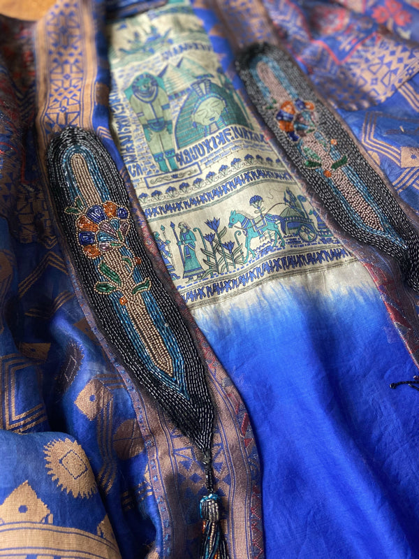 Egyptian Revival 1920s inspired full length robe created from vintage and antique textiles. Lapiz lazuli blue and metallic bronze-gold silk brocade. Lined in block printed silk with design of ancient Egyptian figures, pyramids, chariots. Bohemian style from Pavilion Parade.