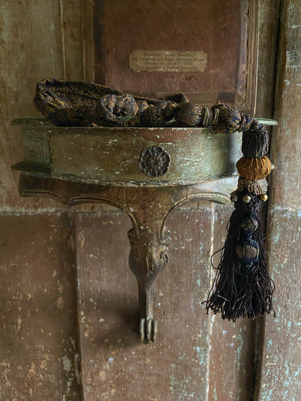 1920s style long silk sautoir necklace with antique tassel embellishment. Bohemian style from vintage textiles by Pavilion Parade. 