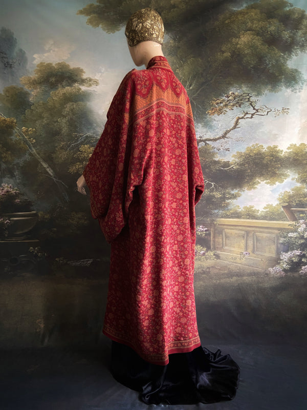 Full length 1920s inspired kimono robe with large patch pockets. Newly created from a claret red, apricot and sage vintage silk crepe. Fully lined in silk with French seams throughout. Bohemian styles sustainably created from antique and vintage textiles by the Pavilion Parade studio.