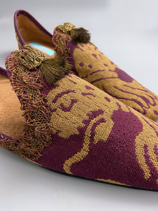 Burgundy red and old gold linen silk brocade slipper shoes. Woven heraldic leopard motifs. Sustainably created from antique textiles from the Pavilion Parade studio.