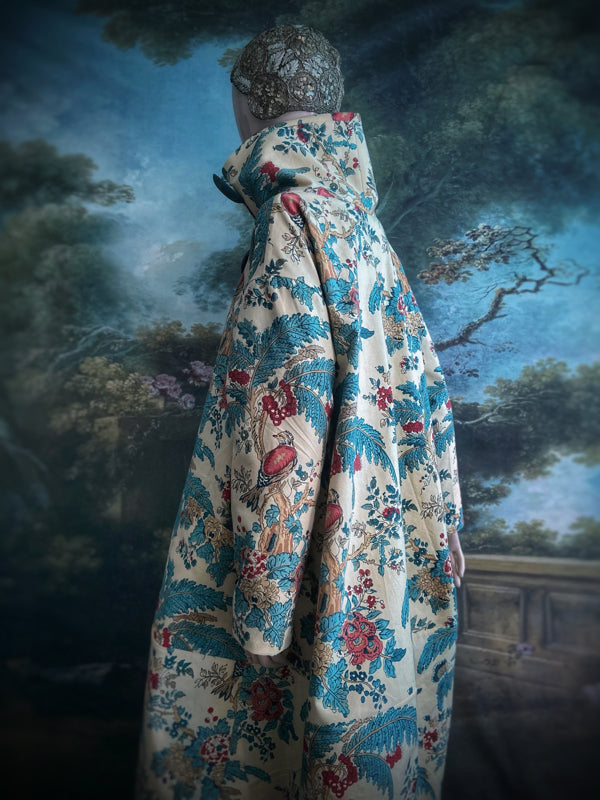 Funnel neck opera coat created from a vintage cotton Indienne featuring exotic birds and florals. Bohemian style created from vintage and antique textiles by Pavilion Parade
