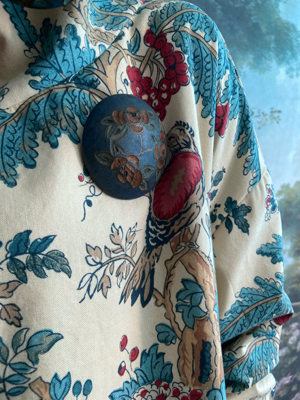 Funnel neck opera coat created from a vintage cotton Indienne featuring exotic birds and florals. Bohemian style created from vintage and antique textiles by Pavilion Parade