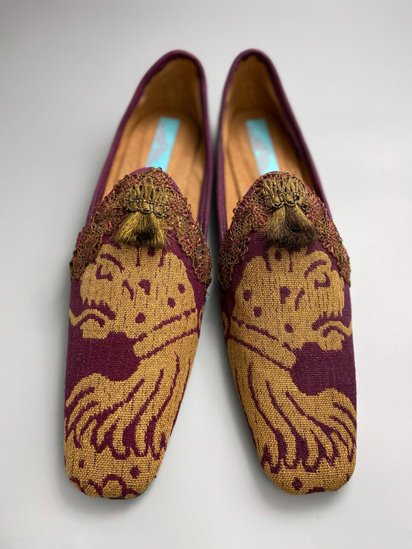 Burgundy red and old gold linen silk brocade slipper shoes. Woven heraldic leopard motifs. Sustainably created from antique textiles from the Pavilion Parade studio.