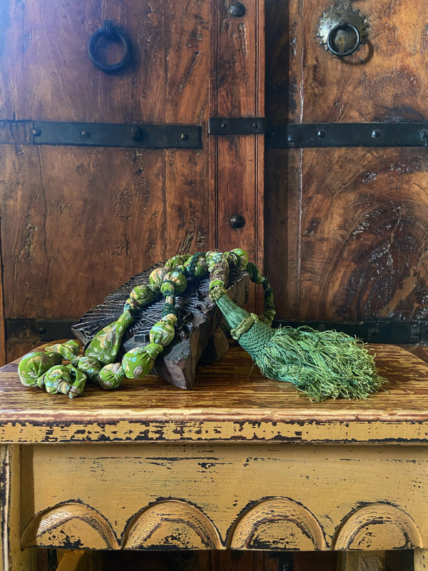 Aesthetic Movement inspired long silk sautoir necklace with antique tassel embellishment. Bohemian style from vintage textiles by Pavilion Parade. 