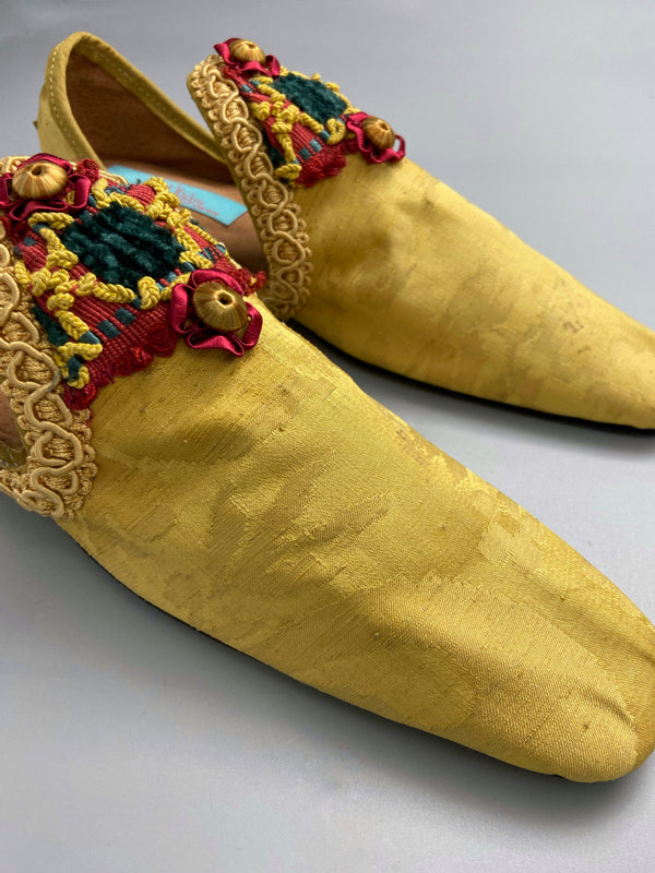 Golden yellow antique silk shoes with red and green silk chenille passementerie braid embellishment. Bohemian styles by Pavilion Parade