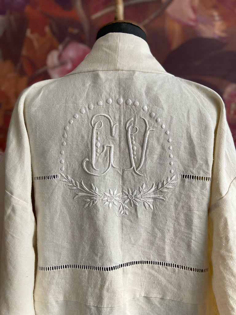 Full length kimono inspired robe with large patch pockets and wide sleeves. Created from an antique heavy French linen trousseau sheet with heirloom embroidery and drawn thread work. All French seamed with hand finished hems and collar. Bohemian styles sustainably created from antique and vintage textiles by the Pavilion Parade studio.