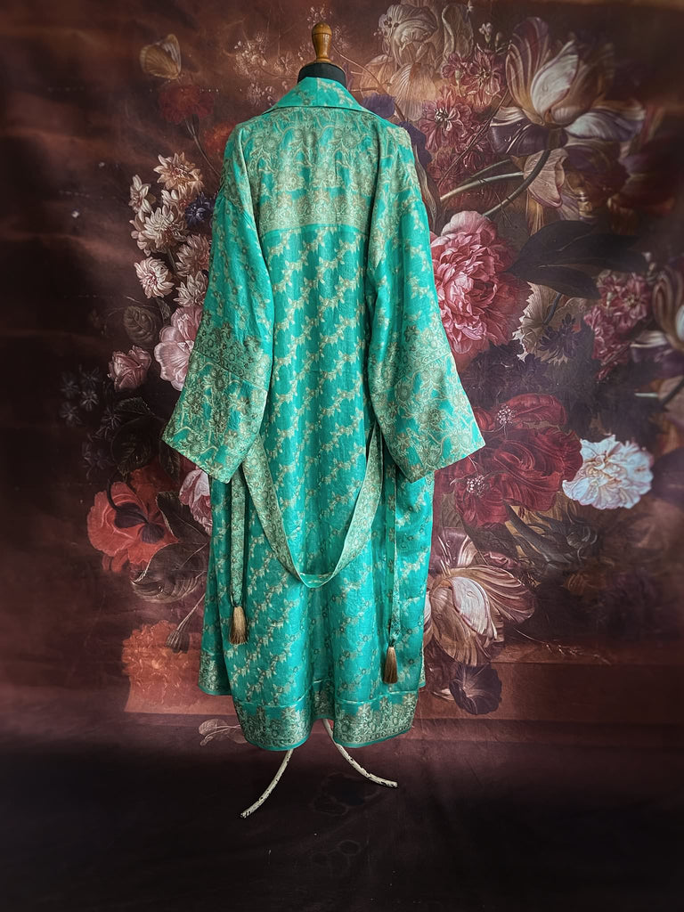 Aqua green and bronze lightweight luxury silk wrapper robe with wide sleeves, large patch pockets and tassel sash. Bohemian style created from antique and vintage textiles by the Pavilion Parade studio.