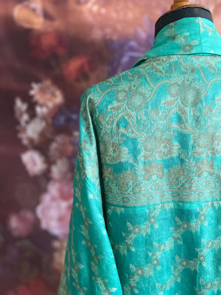 Aqua green and bronze lightweight luxury silk wrapper robe with wide sleeves, large patch pockets and tassel sash. Bohemian style created from antique and vintage textiles by the Pavilion Parade studio.