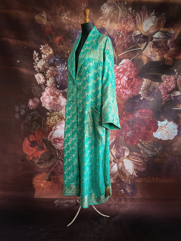 Aqua green and bronze lightweight luxury silk wrapper robe with wide sleeves, large patch pockets and tassel sash. Bohemian style created from antique and vintage textiles by the Pavilion Parade studio.