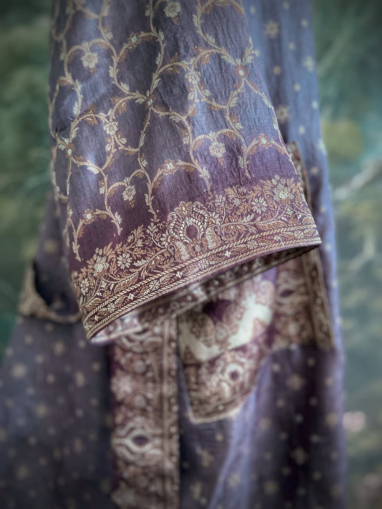Dark lavender, aubergine, and silver-gilt silk robe with wide sleeves, tassel sash, and deep pockets. Unique bohemian styles sustainably created from vintage textiles by the Pavilion Parade studio.