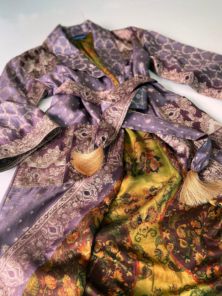 Dark lavender, aubergine, and silver-gilt silk robe with wide sleeves, tassel sash, and deep pockets. Unique bohemian styles sustainably created from vintage textiles by the Pavilion Parade studio.