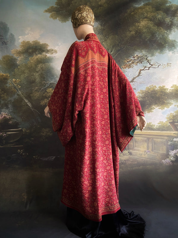 Full length 1920s inspired kimono robe with large patch pockets. Newly created from a claret red, apricot and sage vintage silk crepe. Fully lined in silk with French seams throughout. Bohemian styles sustainably created from antique and vintage textiles by the Pavilion Parade studio.