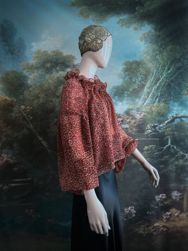 Cinnamon and caramel silk georgette Pierrot blouse with long full sleeves and adjustable drawstring frilled neckline. Bohemian styles sustainably created from antique and vintage textiles by the Pavilion Parade studio. 