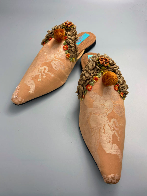 Apricot silk damask cherub shoes with pompom tassels, sustainably created from antique textiles by the Pavilion Parade studio