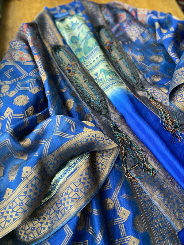 Egyptian Revival 1920s inspired full length robe created from vintage and antique textiles. Lapiz lazuli blue and metallic bronze-gold silk brocade. Lined in block printed silk with design of ancient Egyptian figures, pyramids, chariots. Bohemian style from Pavilion Parade.