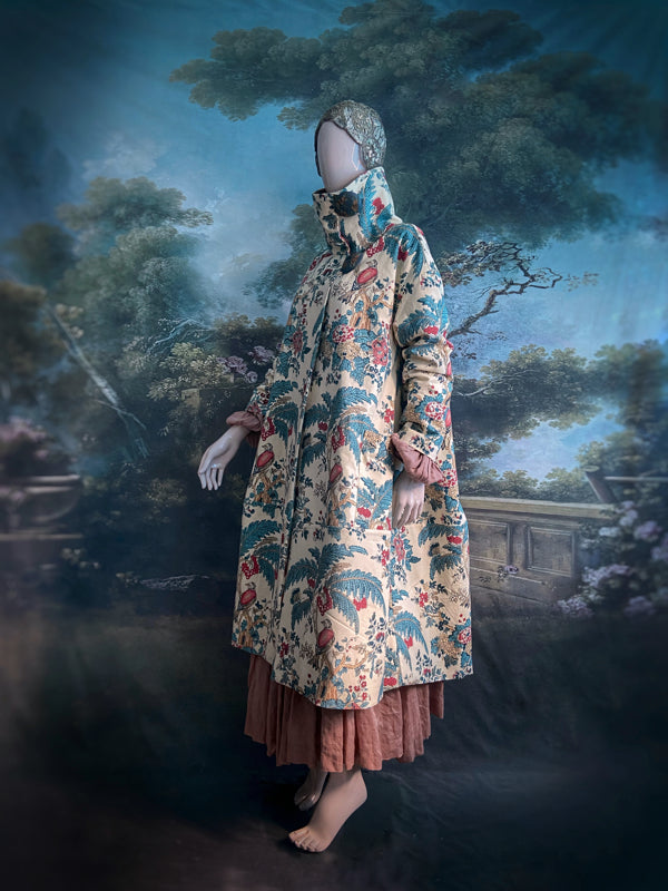 Funnel neck opera coat created from a vintage cotton Indienne featuring exotic birds and florals. Bohemian style created from vintage and antique textiles by Pavilion Parade