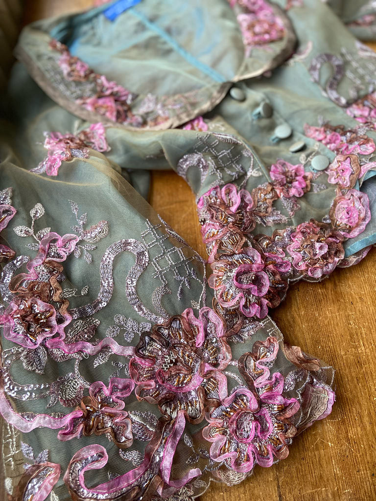 Ribbon embroidered and beaded silk and tulle bodice jacket with picture neckline and pagoda sleeves. French grey, rose pink and lavender. Flight of fancy from the Pavilion Parade studio. 